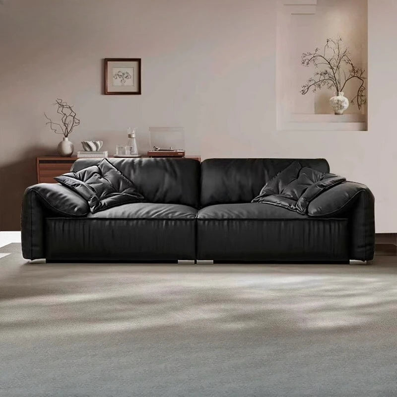 canapé d'angle contemporain noir texture cuir pieds carrés coussins dimensions variables jusqu'à 3.2m