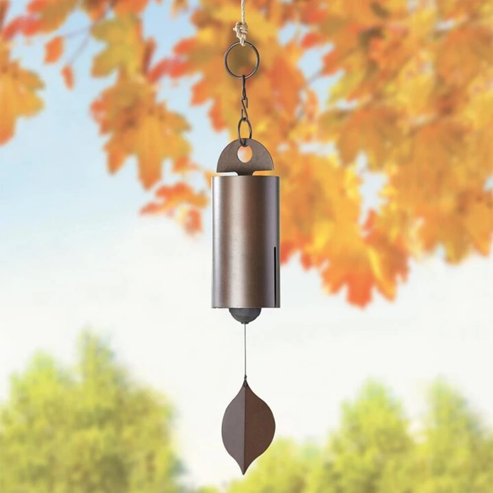 sonaille éolienne cloche vent marron feuille verte rustique nature minimalisteextérieur forêt lac neige