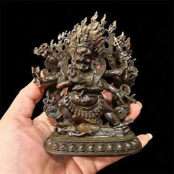 statue religieuse tibetaine bronze figurine details sculptés elements feu crâne base decorée poids indiqué