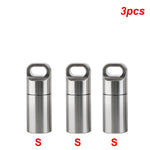 boîte rangement pilules acier inoxydable argenté moderne anneaux bouchons porte clés