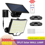 Applique murale solaire LED avec détecteur de mouvement PIR installée sur un mur de jardin