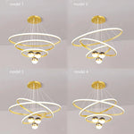 suspension lumineuse moderne or blanc anneaux superposés intérieur chambre salon