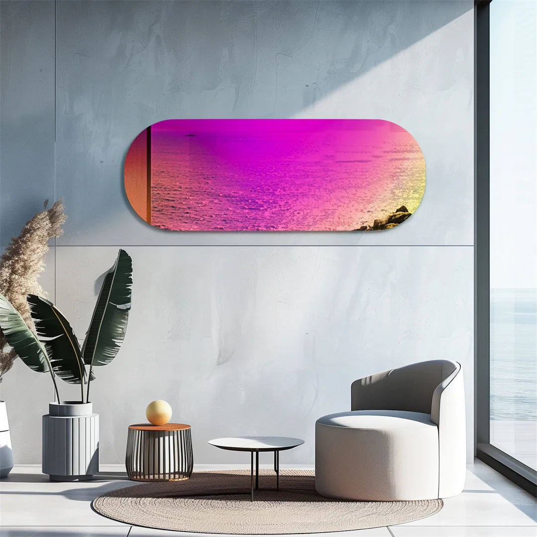 Coucher de soleil coloré sur la mer, avec une palette de couleurs vives allant du rose au jaune, créant une ambiance relaxante et apaisante dans cette pièce de design contemporain.
