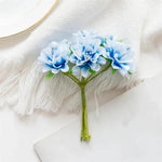 bouquet artificiel fleurs rouge rose jaune violet bleu blanc moderne intérieur décoration festive