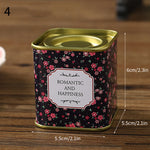 boîtes métal bleu rose noir fleurs vintage capsules étiquettes messages conservation snacks thé