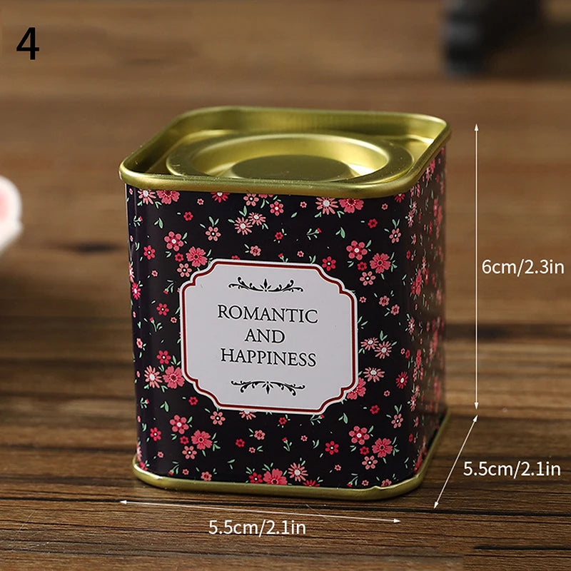boîtes métal bleu rose noir fleurs vintage capsules étiquettes messages conservation snacks thé