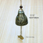 cloche décorative artisanale bronze doré motifs poissons oiseaux vintage(chaines bois)