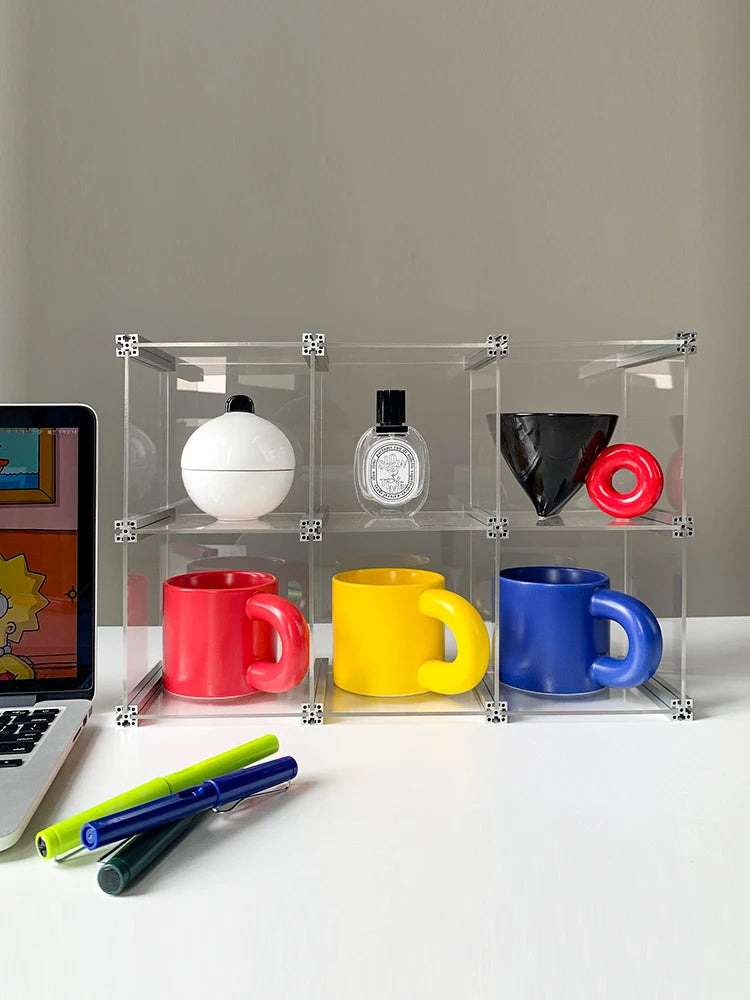 organisateur rangement modulaire transparent bleu clips métalliques compartiments tasses bouteilles bol assiette gâteau tablette