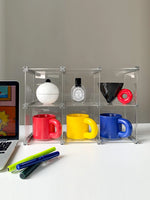 organisateur rangement modulaire transparent bleu clips métalliques compartiments tasses bouteilles bol assiette gâteau tablette