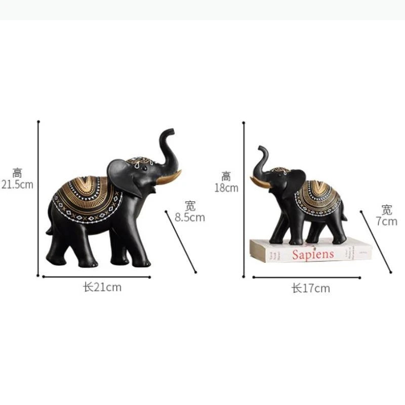 décoration moderne deux éléphants figurines noir blanc motifs tribaux surfaces brillantes