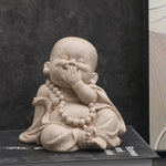 statuettes bouddha enfant résine beige clair marron motifs dorés zen