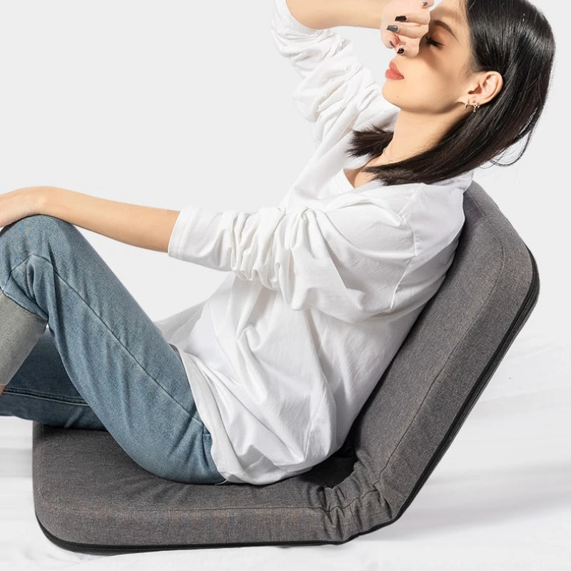 coussin pliable tissu gris moderne minimaliste poignée boutons fermeture confortable assise repos meditation portable