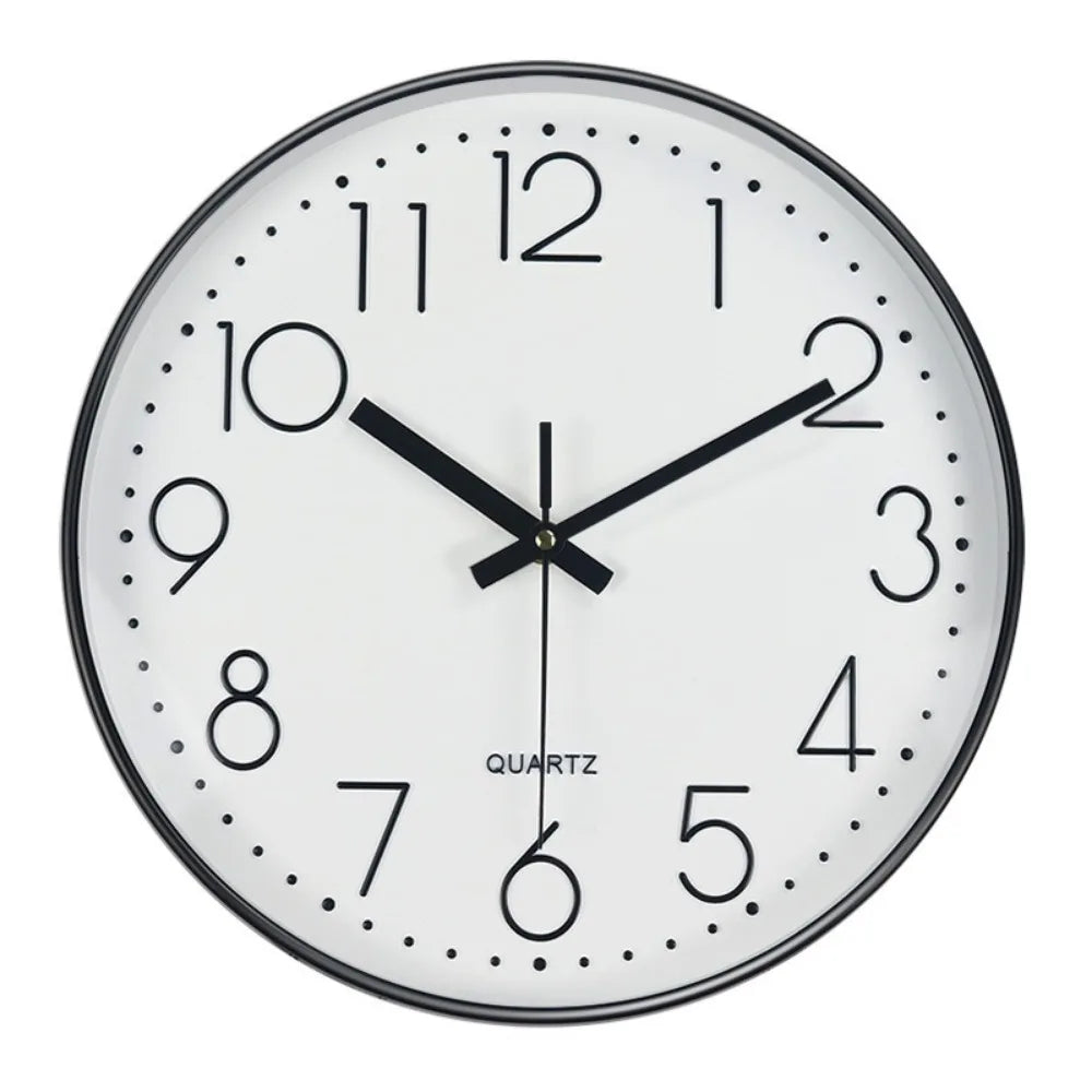 horloge murale cadre doré aiguilles noires numéros blancs moderne chambre coucher