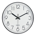 horloge murale cadre doré aiguilles noires numéros blancs moderne chambre coucher