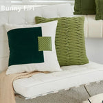 coussin vert olive rayures moderne décoration intérieure blanc motif géométrique noir plissé