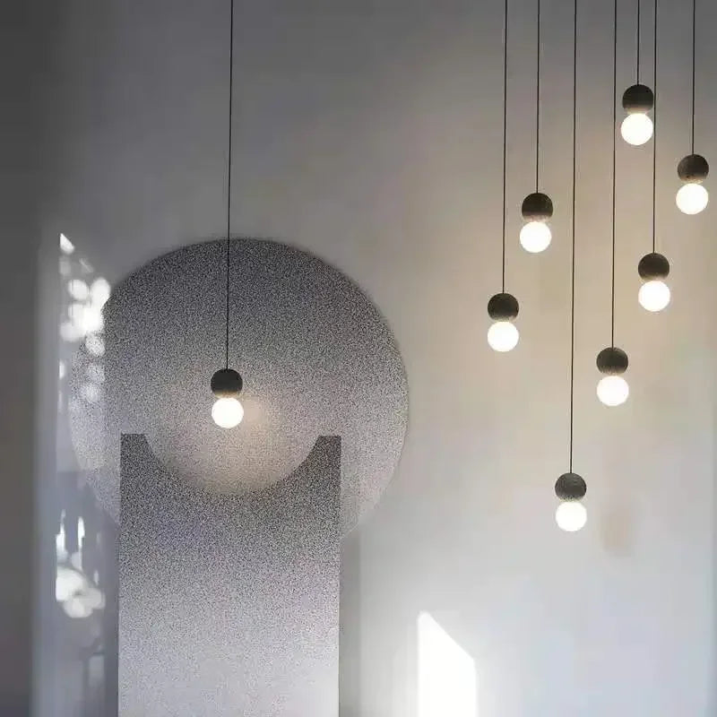 suspension lumineuse moderne noir blanc grains opacité câble pendentif minimaliste terrazzo chambre