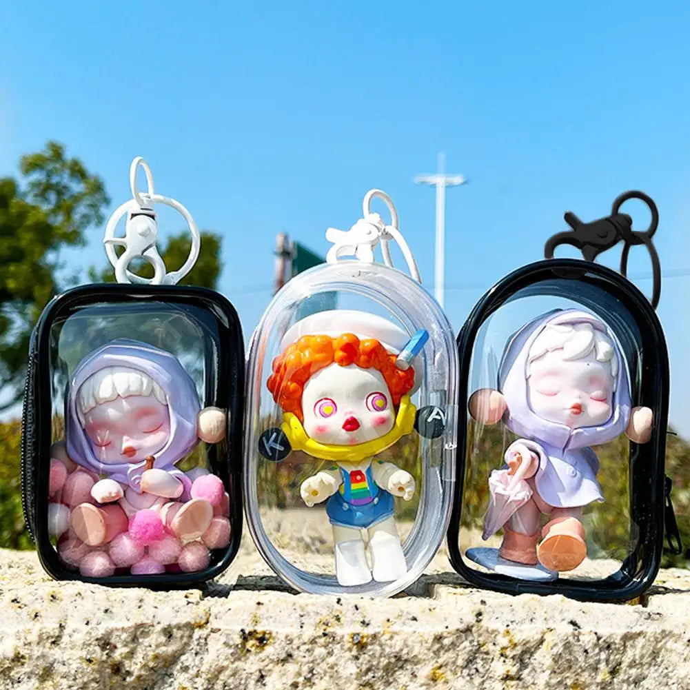 boîtes mystère transparentes accessoires poupées figurines clips personnages stylisés pop art transparentes enfants adolescents