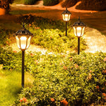 lampe solaire extérieure or noir classique ornements dorés panneaux solaires pied métallique autonomie led