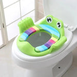 assise toilette enfant grenouille rose vert bleu rayures multicolores supports blancs ludique animalier