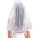 voile mariée inscription bride to be tissu texturé moderne transparent blanc rose festive