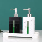 distributeur savon liquide céramique marbre blanc noir vert moderne salle bain parfum fleurs séchées
