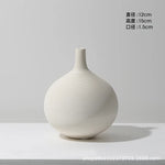 vases céramique blancs rayures horizontales modernes fleurs artificielles