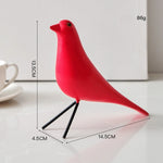décor oiseau bois peint jaune noir rouge bleu blanc vert pieds métalliques moderne salon