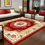 Un tapis ornementé de fleurs colorées, avec une bordure dorée, qui ajoute une touche de décor élégante à l'espace.