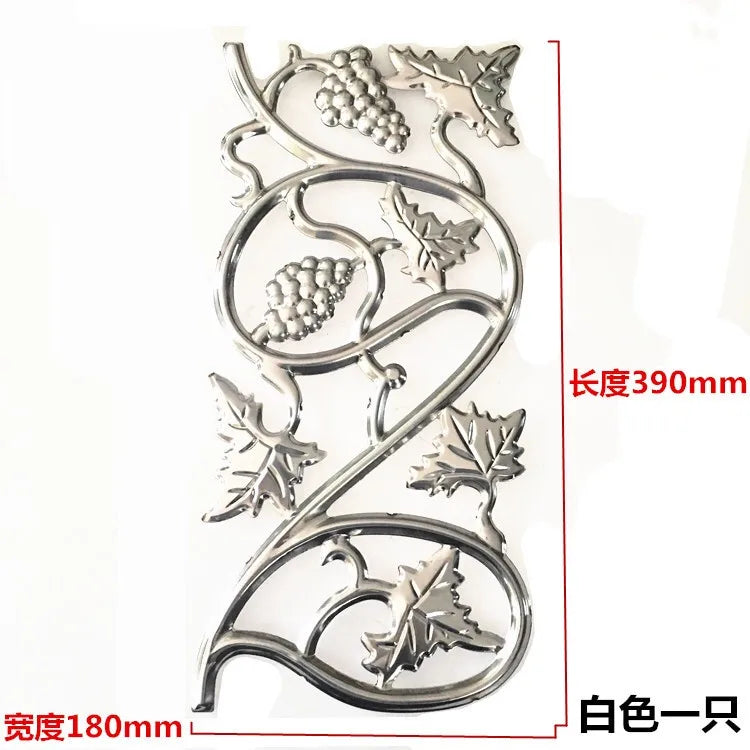 ornement métallique doré floral art nouveau baroque fixations invisiblesextérieur maison deco porte fleuri geometrique