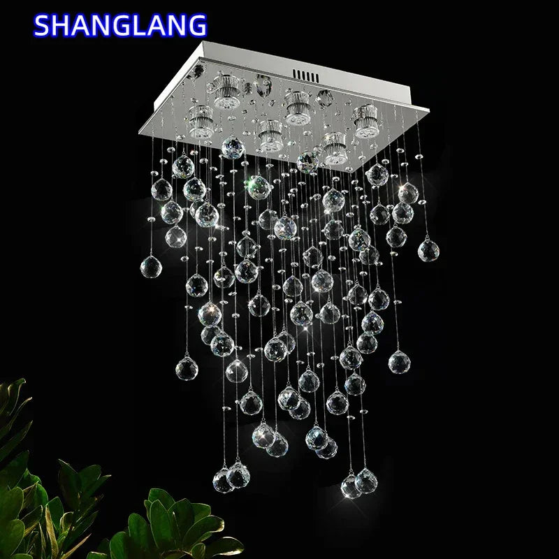 suspension lumineuse moderne transparente cristal brillantes élégante dorée fixations invisibles chaînes incluses