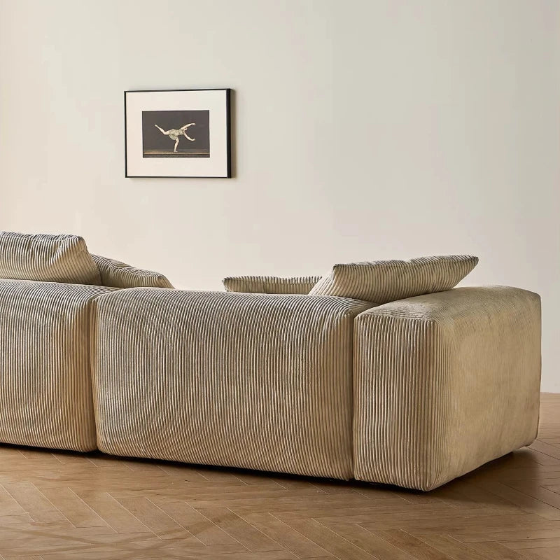canapé modulaire velours rayures beige clair moderne salon bois oreillers minimaliste