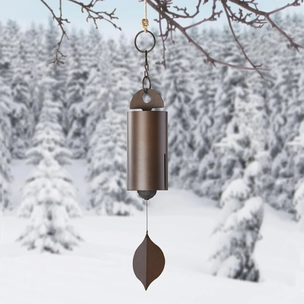sonaille éolienne cloche vent marron feuille verte rustique nature minimalisteextérieur forêt lac neige