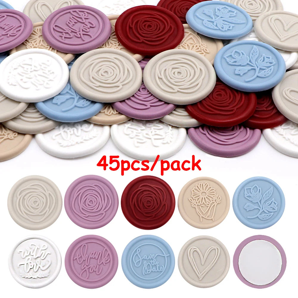 timbres cire classiques adhésifs blanc bleu doré rose feuilles empreintes pieds roses enveloppes cartes