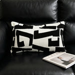 housse coussin géométrique moderne polyester coton noir blanc orange beige minimaliste contemporain ornemental 45x45cm