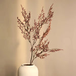 bouquet artificiel moderne rose clair rouge foncé jaune doré feuilles fines minimalisteintérieur décoration maison