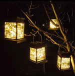 lanterne solaire cuivre noir filet lumineux moderne extérieure jardin cour patio tringle