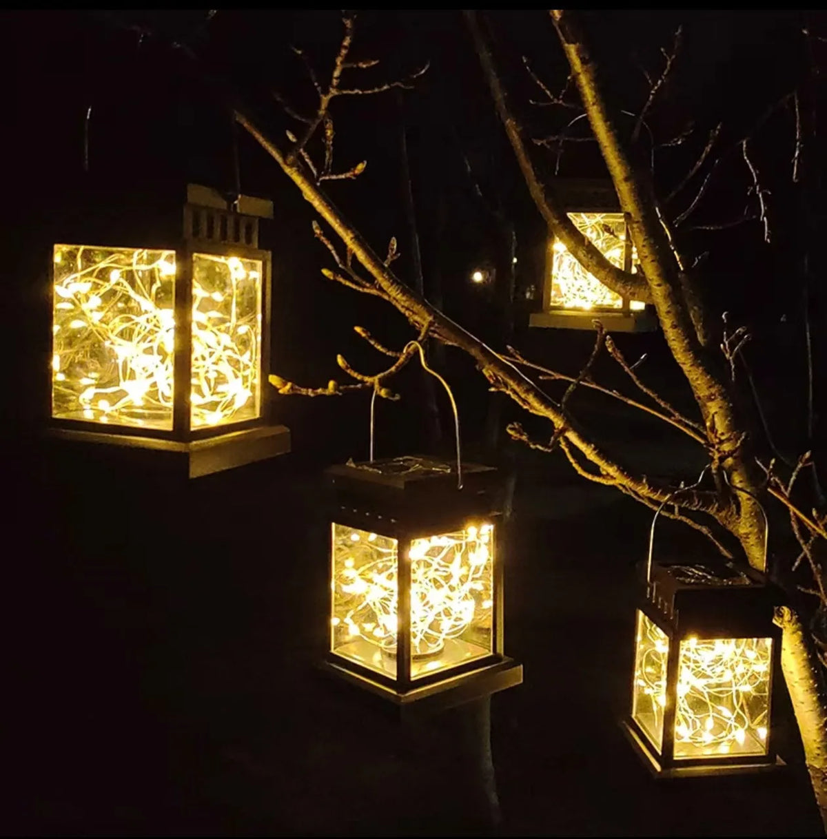 lanterne solaire cuivre noir filet lumineux moderne extérieure jardin cour patio tringle