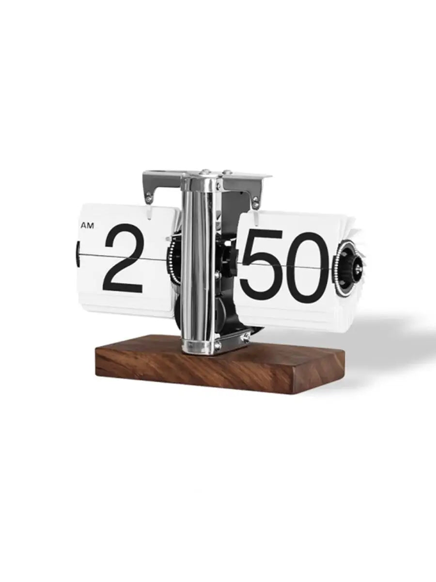 horloge numérique moderne horloge pieds boules chiffres noirs fond blanc métal brillant minimaliste affichage