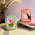cadres photo modernes motifs floraux chats couleur vert rose blanc deco