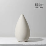 vases céramique blancs rayures horizontales modernes fleurs artificielles