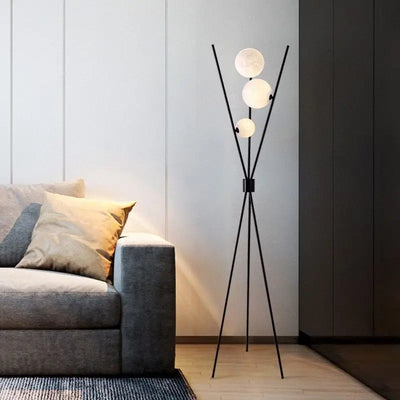 Lampadaire nordique minimaliste trois pieds abat-jour lunaire blanc