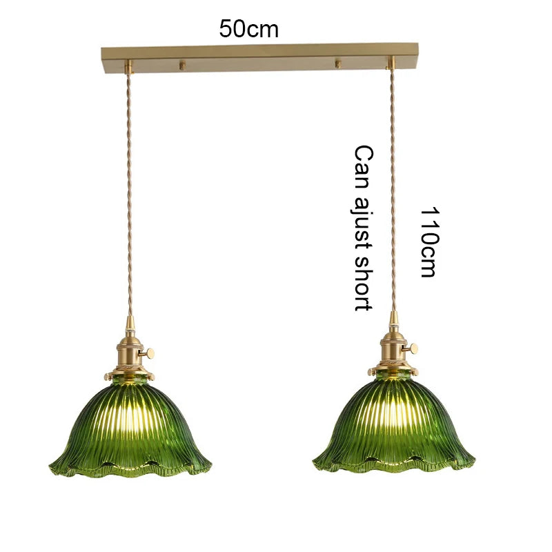 suspension lumineuse vintage vert doré motifs géométriques ampoules câbles chaînes métal