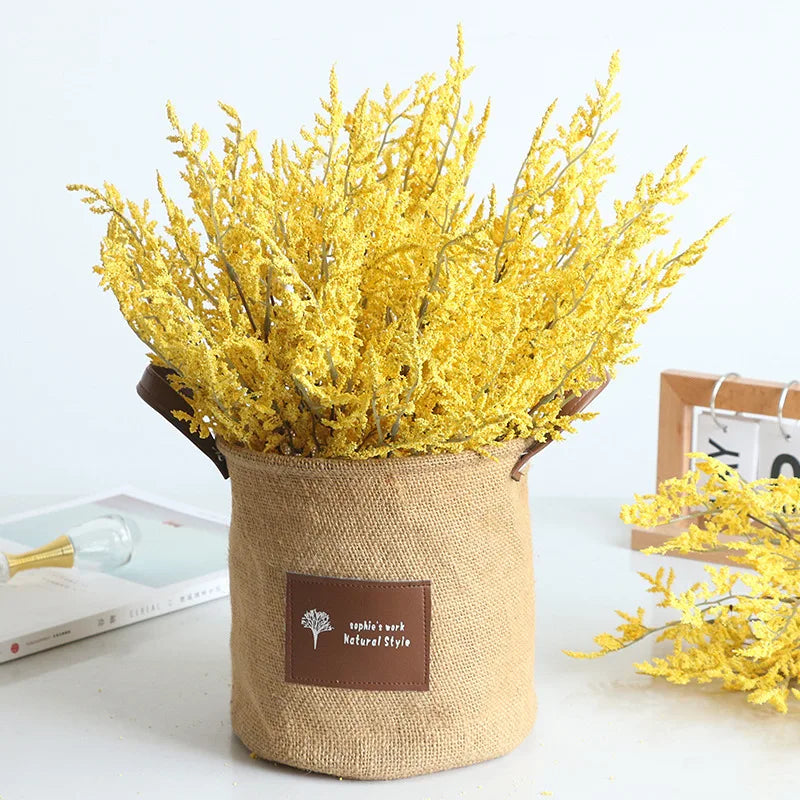Composition florale avec gypsophile rose