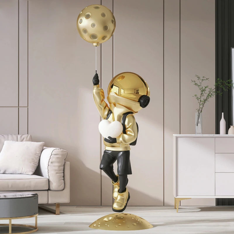 statuette astronaute résine couleur changeante doré argenté rose jaune moderne brillant métallique fixations