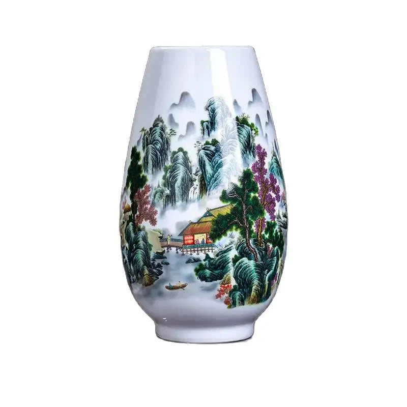 Un vase en porcelaine décoré d'un paysage de montagnes boisées, de cascades et de maisons de style traditionnel chinois.