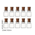 bouteilles verre transparentes bouchon liège charms huiles essentielles coquillages