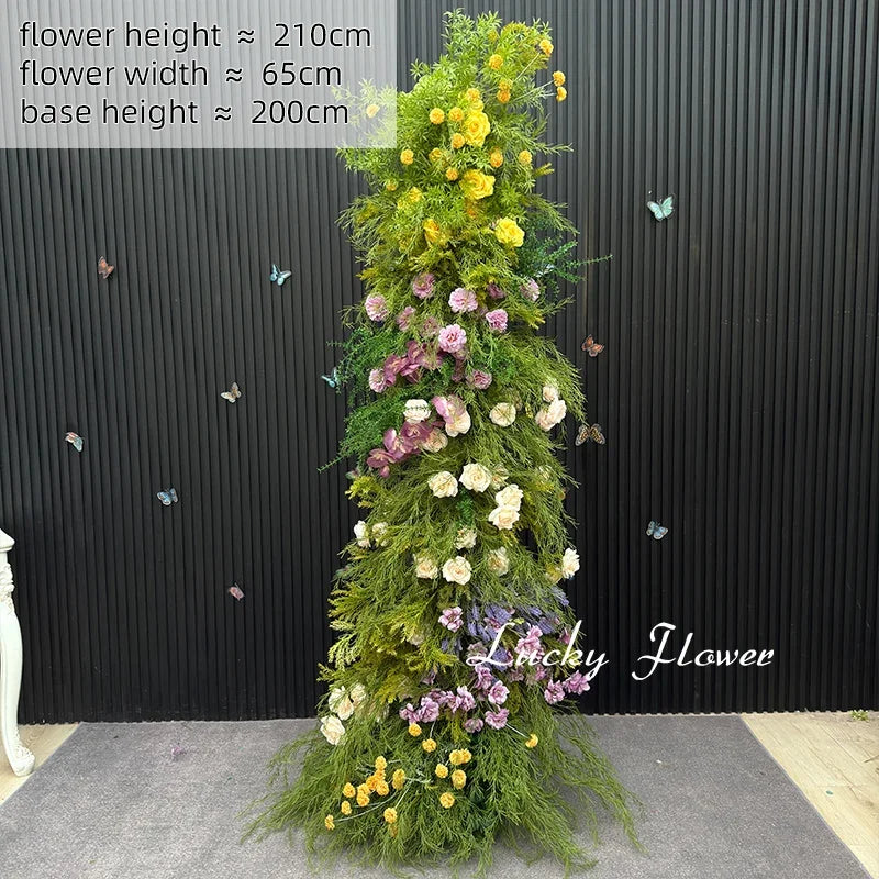 décoration murale naturelle composition florale variée couleurs vives rustique bienvenue mariage