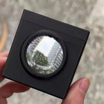 cube optique contemporain noir blanc objectif optique portable studio matériau opacique