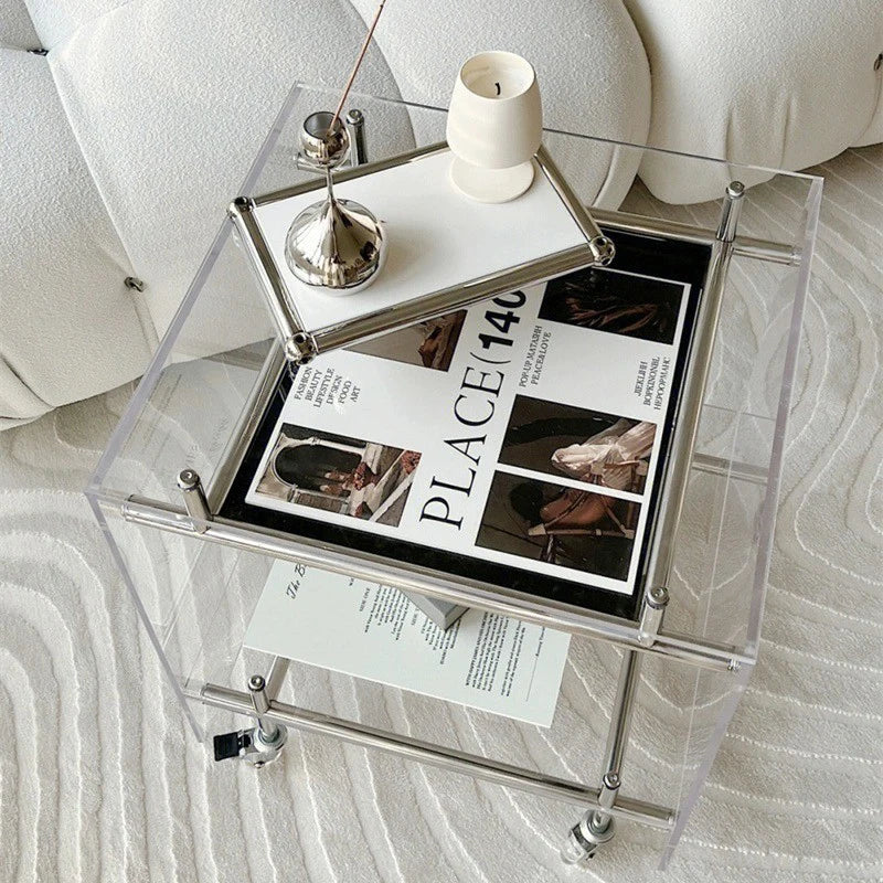 table basse moderne transparente roulettes minimaliste plateau carré blanc gris magazines vases télécommande
