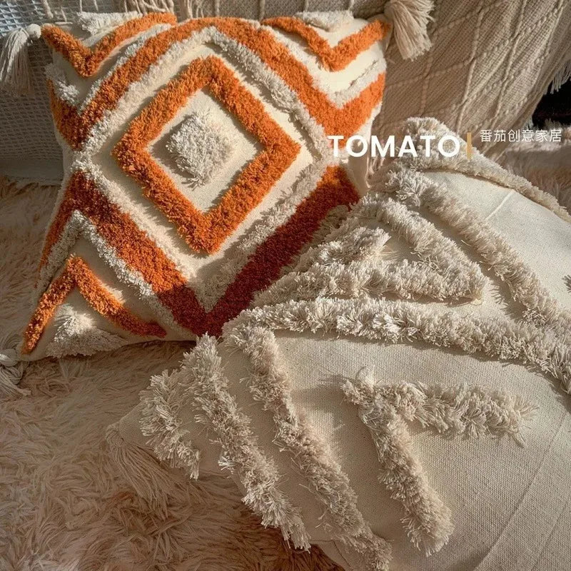 taies d'oreiller géométriques brodées boho chic couleurs beige orange gris franges respectueuses environnement decoration